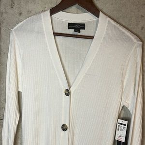 NEW International INC Company sweater